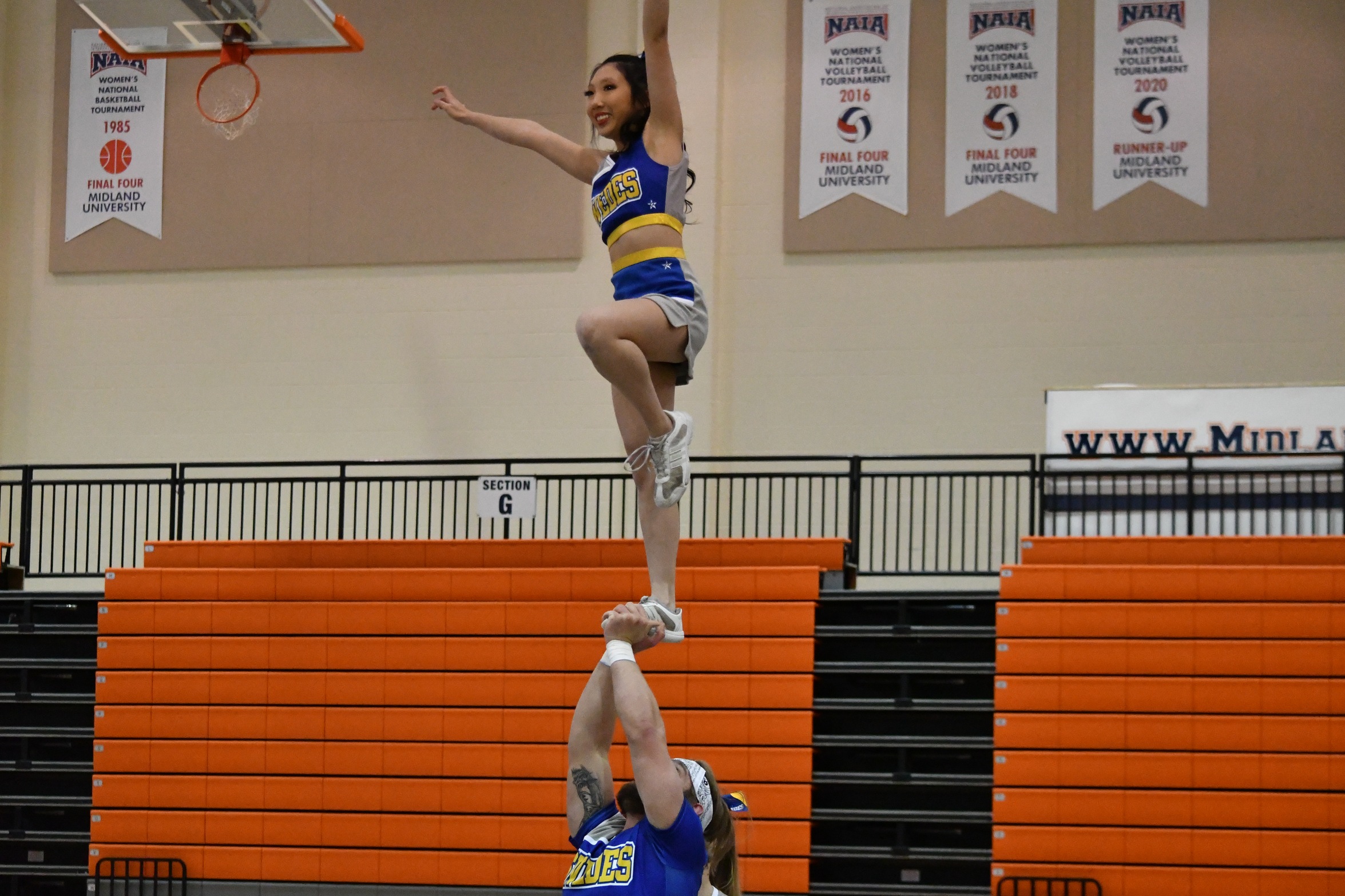 CHEER TEAM KICKS SEASON OFF AT MIDLAND INVITATIONAL