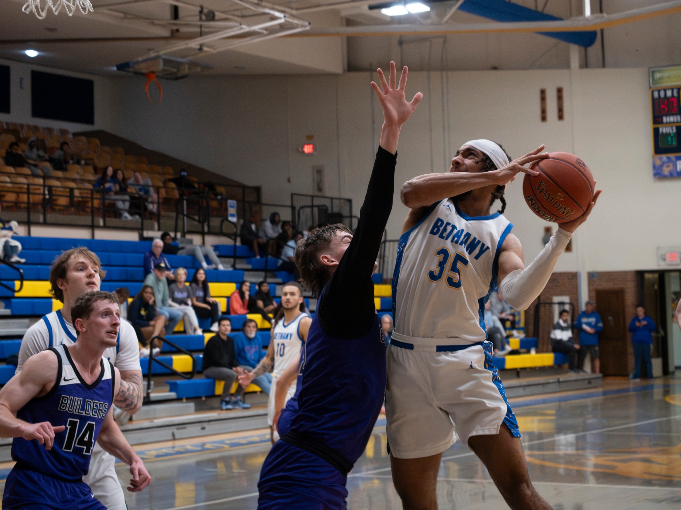 SWEDES FALL IN HIGH-SCORING CONFERENCE BATTLE WITH TABOR
